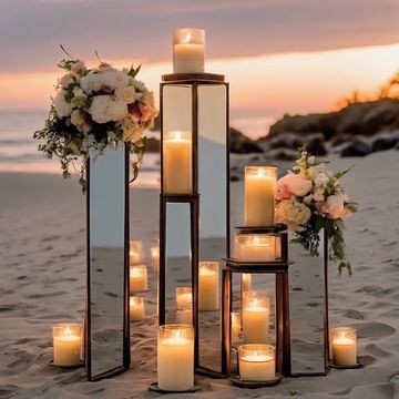 Anniversary or proposal on a sandy beach,with mirrorpedestals,candles and flower.Fiance will love it