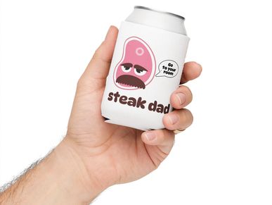A hand holding an aluminum can with a can cover on it, with a illustration named Steak Dad.