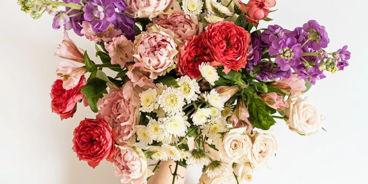 A vibrant bouquet of mixed flowers in various colors.