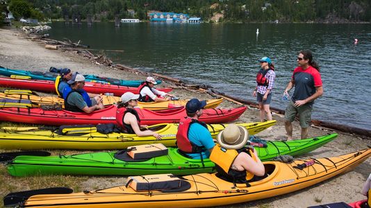 Kayak lesson on the shores of Kootenay Lake in Kaslo, BC.