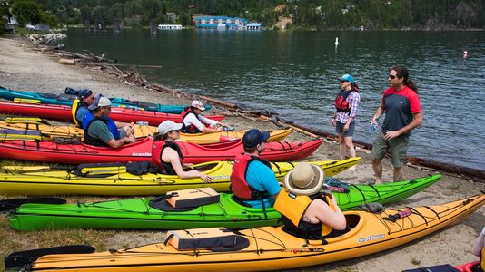 Kayak lesson on the shores of Kootenay Lake in Kaslo, BC.