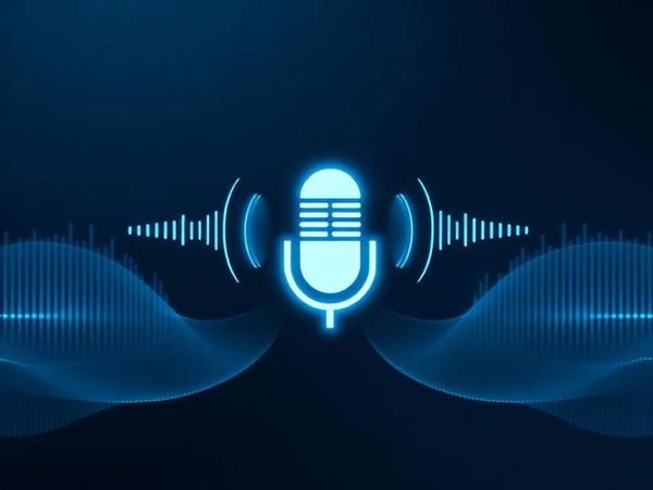Glowing microphone icon with sound waves on a dark background.