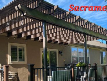 Backyard patio with pergola and string lights in Sacramento, CA.