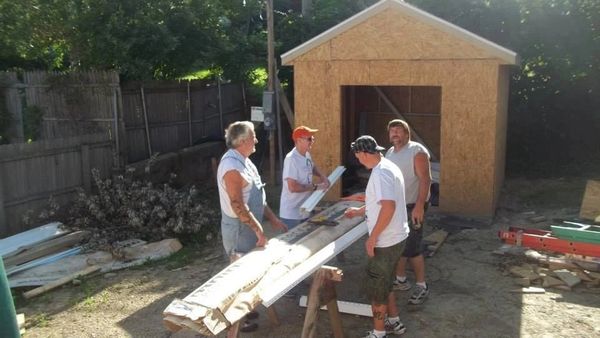 Models, Designers, supporters and (DE-FI) leaders participate in a Habitat For Humanity Build.