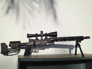 Precision sniper rifle with scope and bipod.