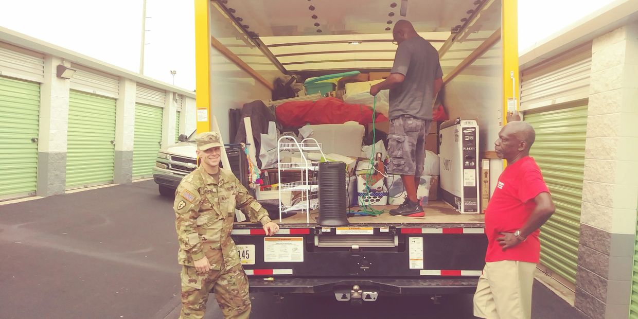 PCS move with active duty soldier and 2 Veterans loading a truck.