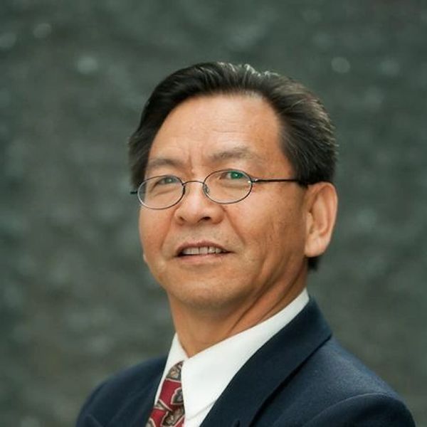 A headshot of Jianmin Duan, Ph.D.