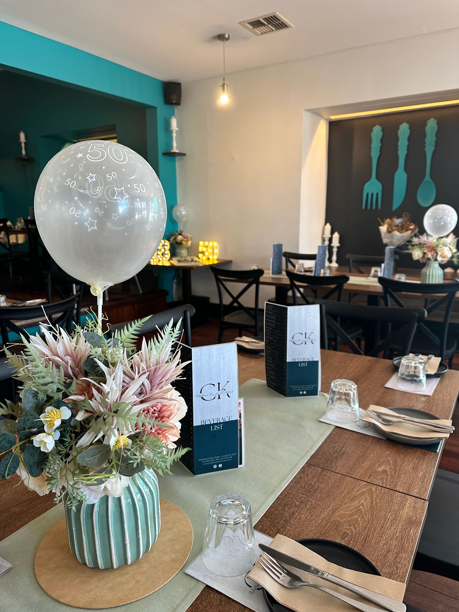 A set table in the Catalano dining room