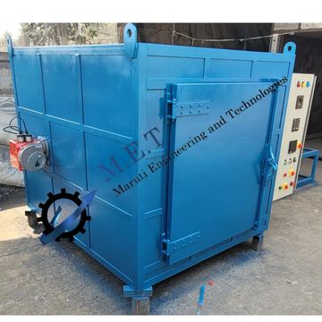 Industrial blue metal drying oven with control panel.