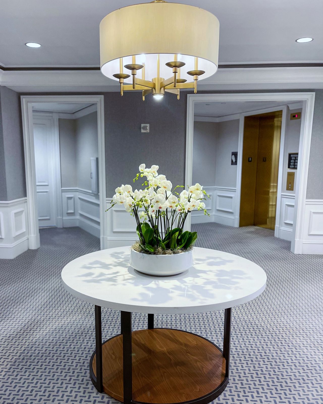 Orchid arrangement at The Ritz Residences on Lido Key