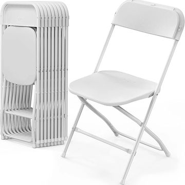 White folding chairs, one folded and stacked, one open for seating.
