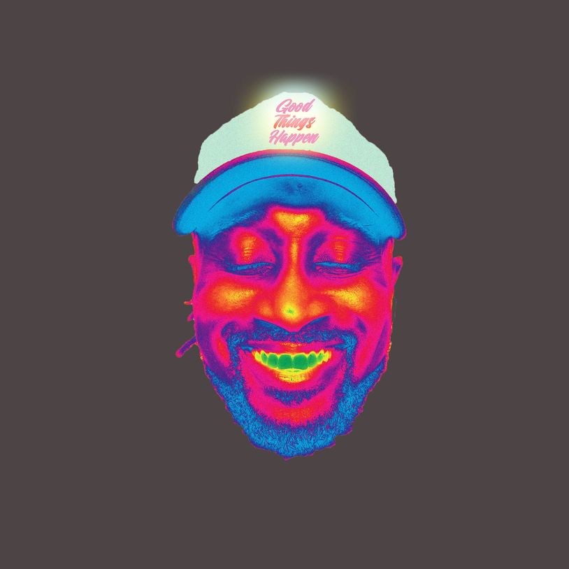 Thermal image of a smiling man wearing a 'Good Things Happen' cap.