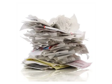 A messy stack of crumpled papers piled up.