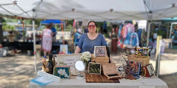 Handmade cigar box purses at the market.