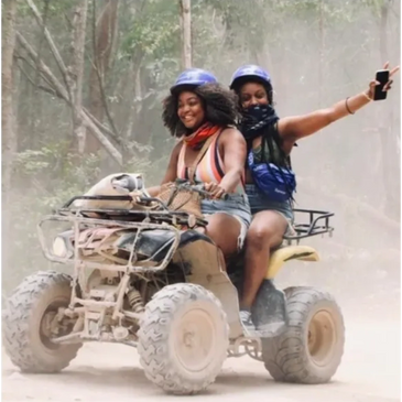 Girls on an ATV drive, Akumal, Tulum