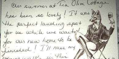 Handwritten note with a stylish fox illustration.