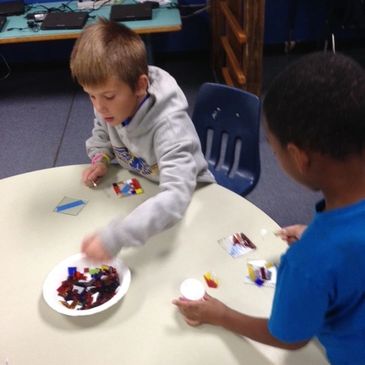 Students working with glass