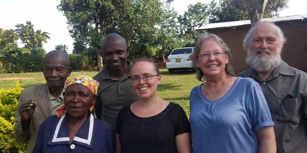 Elliot and Sacha with their parents, at home in Mambai, Kenya