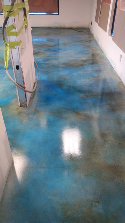 A "hybrid" decorative concrete floor. Tough, artistic, cost-effective.  