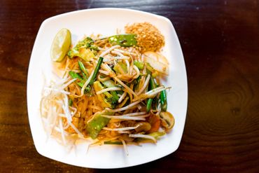 a  plate of food with sprouts on it