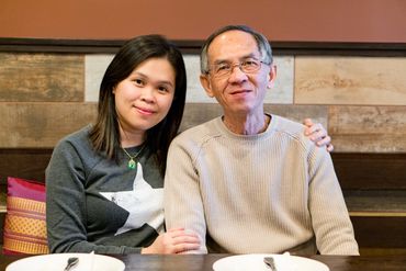 a woman and man posing for a picture 
