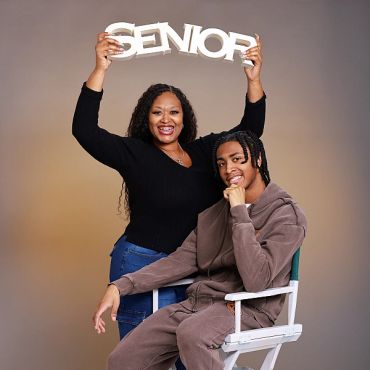 Two people celebrating senior year.