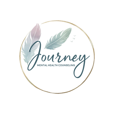 A serene landscape featuring mountains, a calm lake, and lush greenery under a clear blue sky.