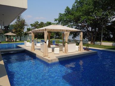 Casa 88 en Tequesquitengo con alberca para fin de semana, fiestas y grupos