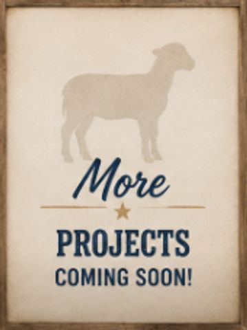 Sign announcing more projects coming soon with a sheep silhouette.
