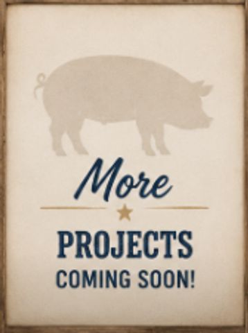 Sign with pig silhouette and text about upcoming projects.