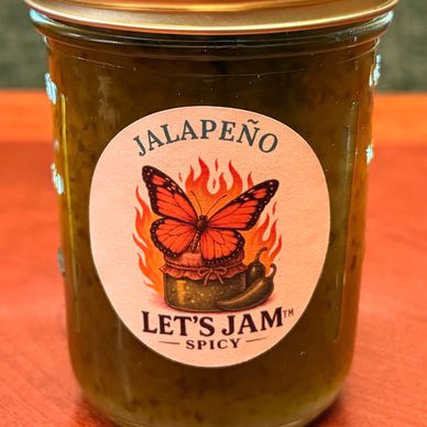 Jar of spicy jalapeño jam with a butterfly label.