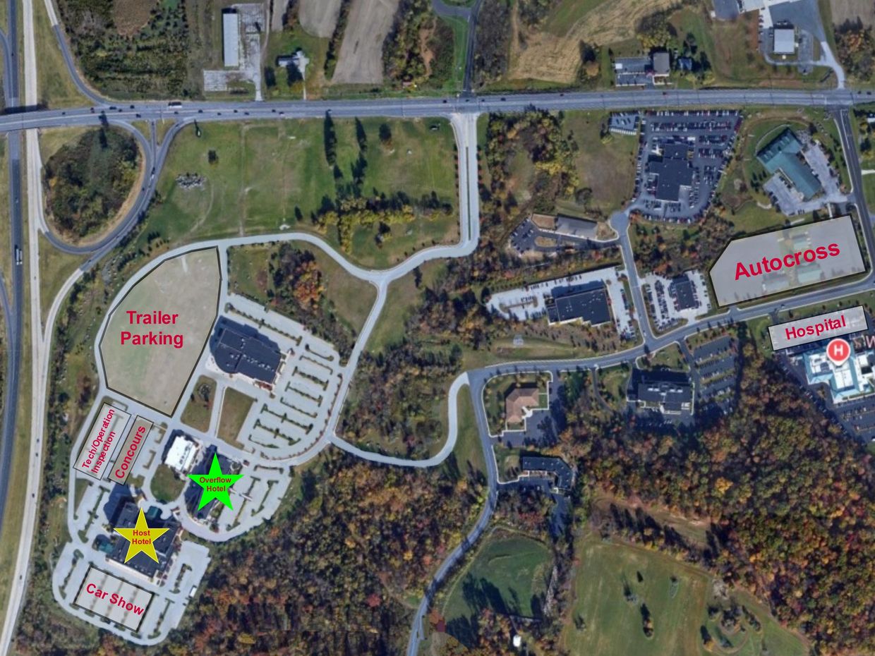 Aerial view of a labeled event venue with parking, hotels, and activity areas.