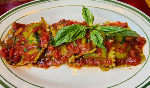 Vegan-Gluten Free Spinach Ravioli filled with zucchine, asparagus, in a fresh organic tomato sauce a