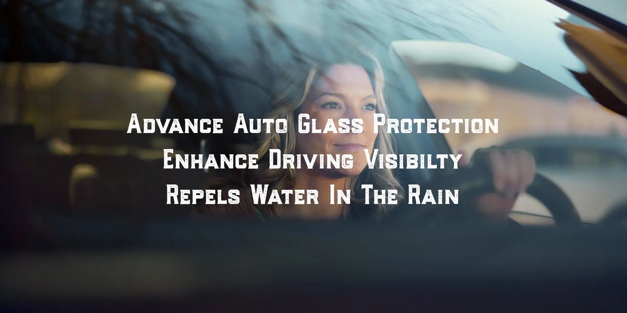 Woman driving with clear auto glass protection enhancing visibility.