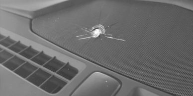 Windshield crack repair on car windshield