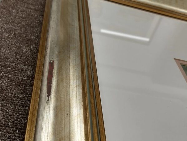 An example of a damanged picture frame ready for restoration.
