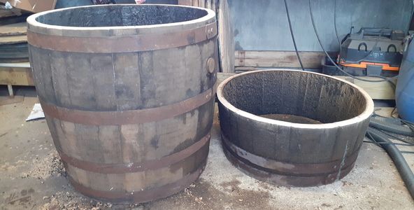 hogshead whisky barrel planters cut to custom height by wee dram barrel creations