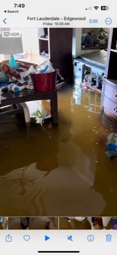 This was taken two days after the flood. At this point the water was low enough to reach the house. 