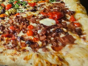 Sweet sauce base, three-cheese blend, all the meats, and sweet peppers