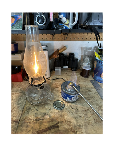 Heating the branding iron by sterno with a oil lamp.