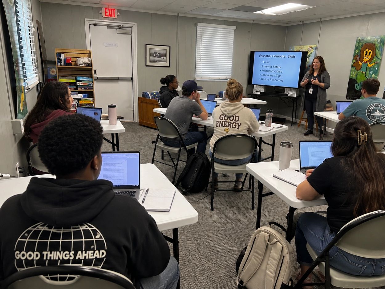 Classroom training session on essential computer skills.