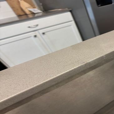 invisible granite chip repair using custom color-matched resin for a homeowner in Greater Seattle 