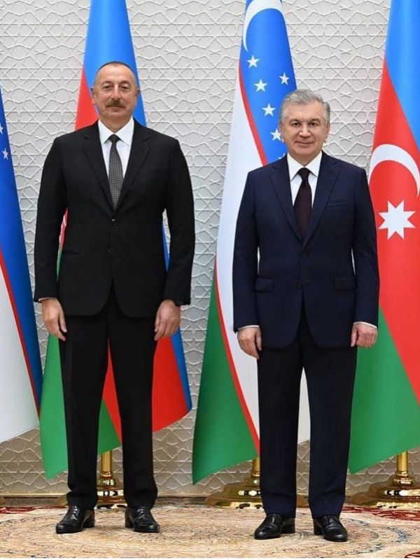 A moment of honor — our handmade silk carpet beneath the Presidents of Uzbekistan and Azerbaijan.