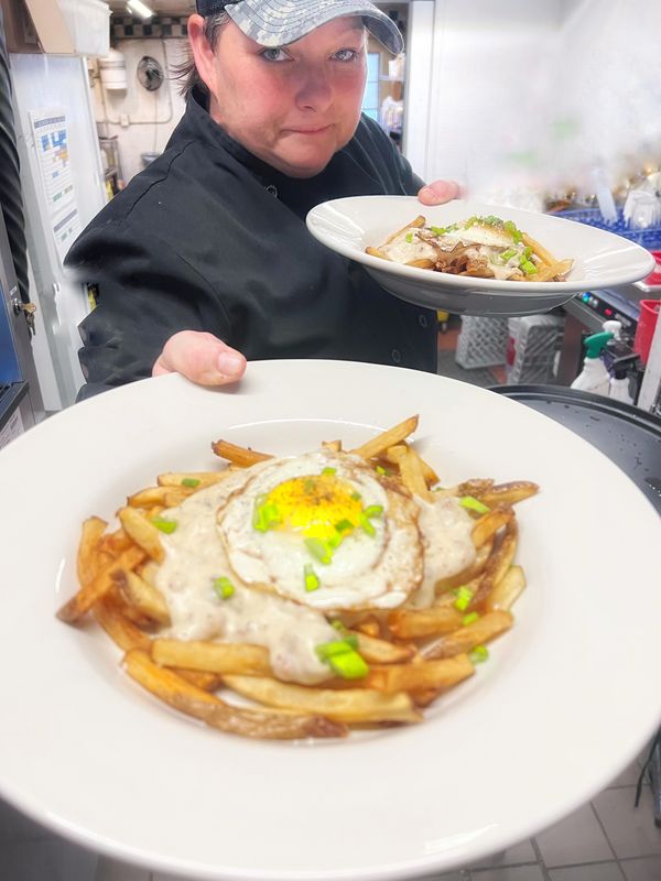 Chef Jo with some of her signature dishes