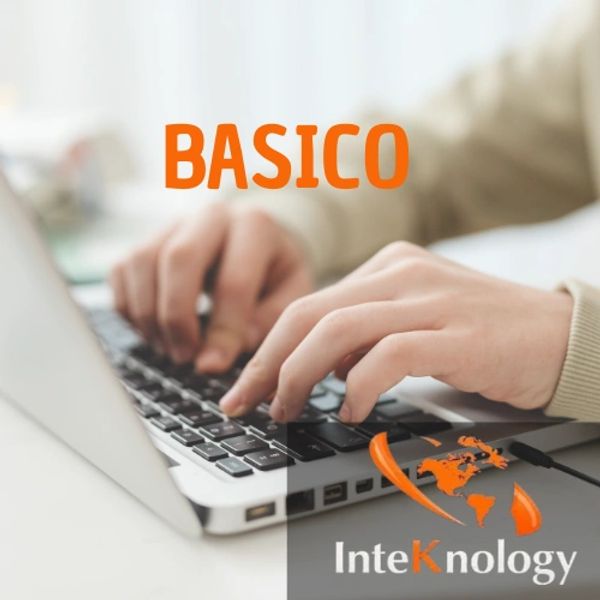 Manos escribiendo en un teclado de laptop.