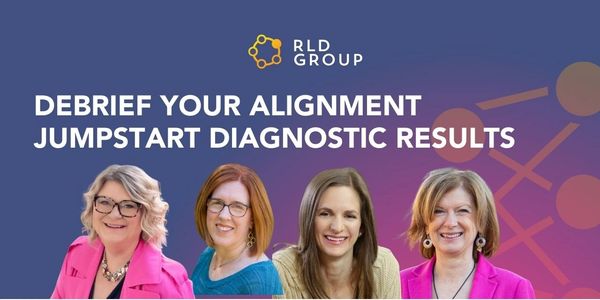 Four professional women smiling under RLD Group branding about alignment diagnostic results.
