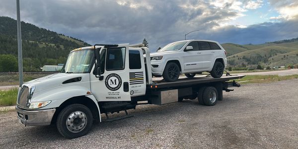 Montana Towing Light duty rollback Towing