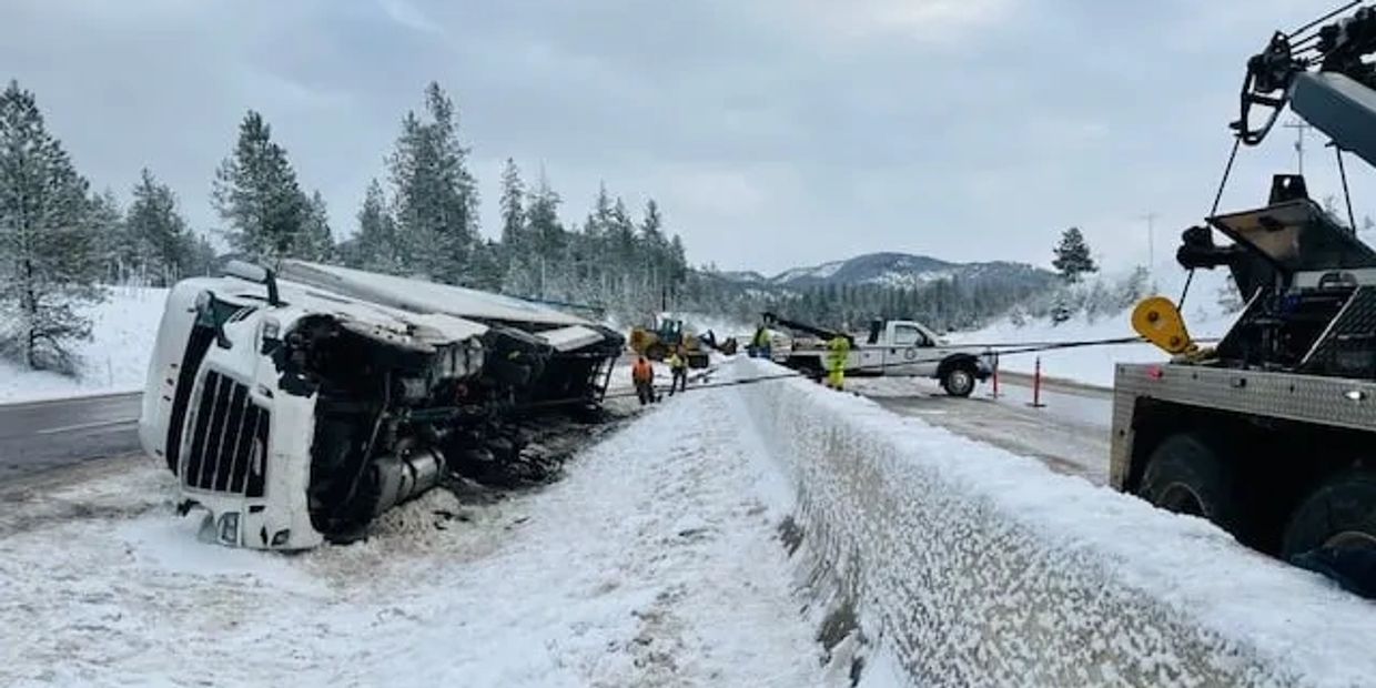 Montana Towing wreckers recover a Semi-tractor Trailer on I-90 in Lozeau, MT.