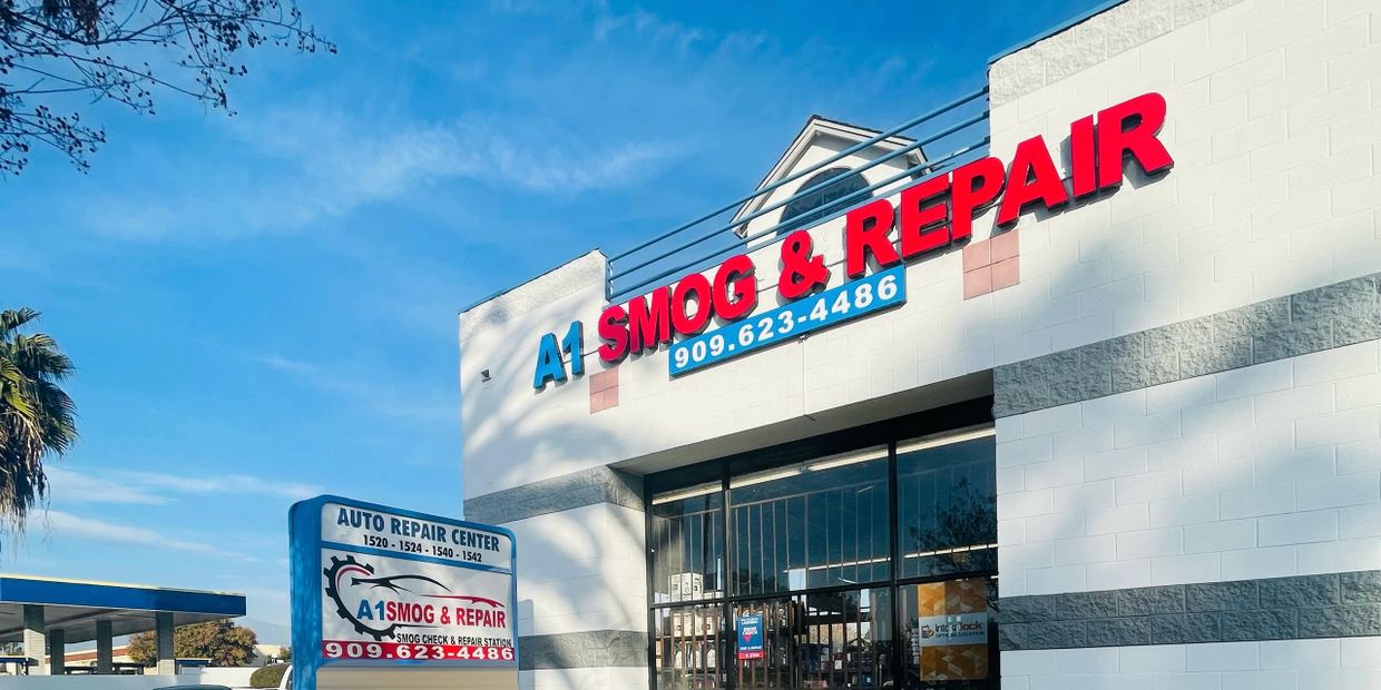 A1 Smog &amp; Repair auto repair shop under a clear blue sky.