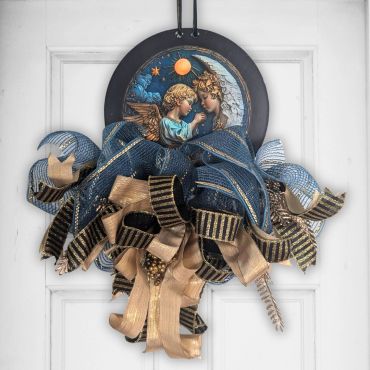 Decorative hanging ornament with angels and blue-gold ribbons.